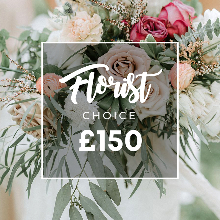 An artful, modern bohemian hand-tied bouquet sits in a softly lit Stanmore studio, radiating a chic natural elegance. Pale pink and ivory roses mingle with peach-toned ranunculus, with touches of dusty rose and burgundy adding depth. Silky white waxflower or spray roses offer delicate texture, while lush eucalyptus leaves and silvery-green foliage provide a cool forest-like frame. The arrangement is loose and organic, allowing each bloom to breathe, yielding a refined yet wild look that suits weddings or upscale gifts. A light, semi-transparent white overlay frames the center, where Florist Choice appears in flowing script and CHOICE stands in clean uppercase, followed by the bold ?150 price. The background remains softly blurred to keep the focus on the bouquet's texture and movement. Flowers Stanmore presents this striking piece for discerning clients across Stanmore and surrounding NW London districts, with flexible delivery options and reliable, local service from our Broadway shop.