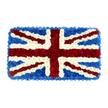 In the photograph, a rectangular floral tribute lies against a plain white background, its entire surface dedicated to a detailed representation of the Union Jack crafted from fresh flowers. The composition transforms the familiar flag into a plush, tactile artwork, where each stripe and segment is built from tightly packed petals. The dominant central cross of St. George appears as a broad band of velvety red blooms, likely chrysanthemums, extending vertically and horizontally with clean, straight edges. From the corners of the rectangle, slender diagonal lines of the same deep red depict St. Patrick's Cross, edged with narrow ribbons of white flowers that create the precise separation between red and the surrounding blue. Beneath those lines, the wider diagonals of St. Andrew's Cross are realised with clusters of bright white petals, adding a luminous contrast that seems to brighten the entire piece. The remaining areas are filled with dense clusters of rich blue florets-possibly hydrangeas or a similar bunched variety-forming a smooth yet gently textured background that frames and unifies the design. The lighting is calm and even, revealing the natural shine of the petals and the subtle relief formed by the overlapping blooms, which gives the impression of a soft, padded flag. This floral Union Jack is clearly intended as a respectful patriotic tribute, perfectly suited to funerals, memorials, or remembrance services in Stanmore, perhaps chosen by local families to honour a veteran, a public servant, or anyone whose life and values were closely intertwined with British identity and national service.